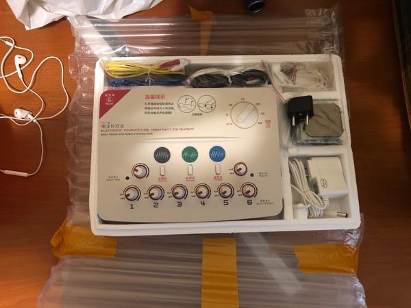Ems-Elektroakupunktur-Behandlung, Nerven- und Muskelstimulator-Massagegerät photo review
