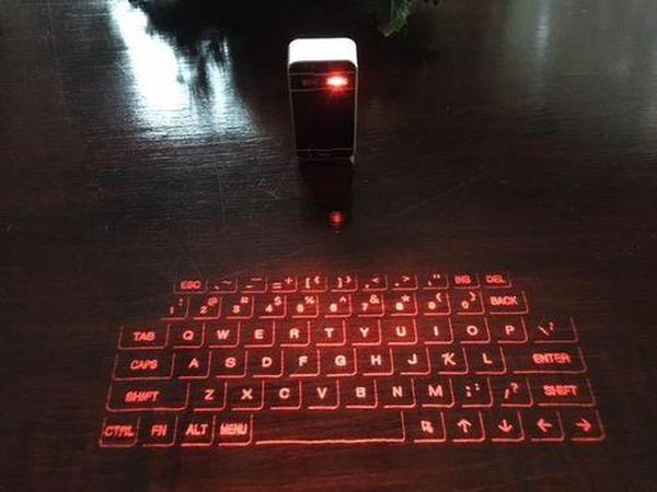 Intelligente projizierte Tastatur für PC, Telefon und Tablet | Drahtlose Lasertastatur photo review